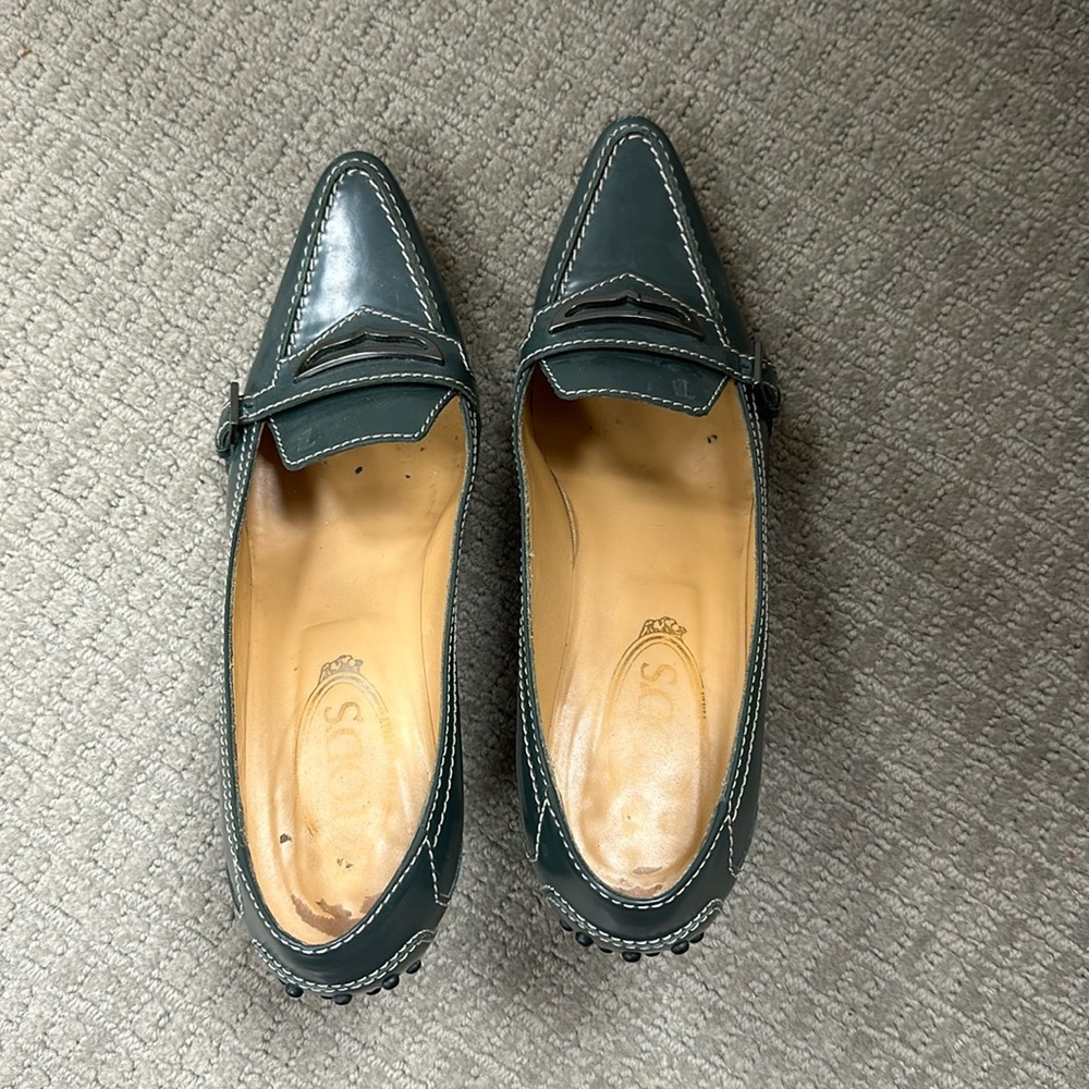 Green Tod’s heeled loafers